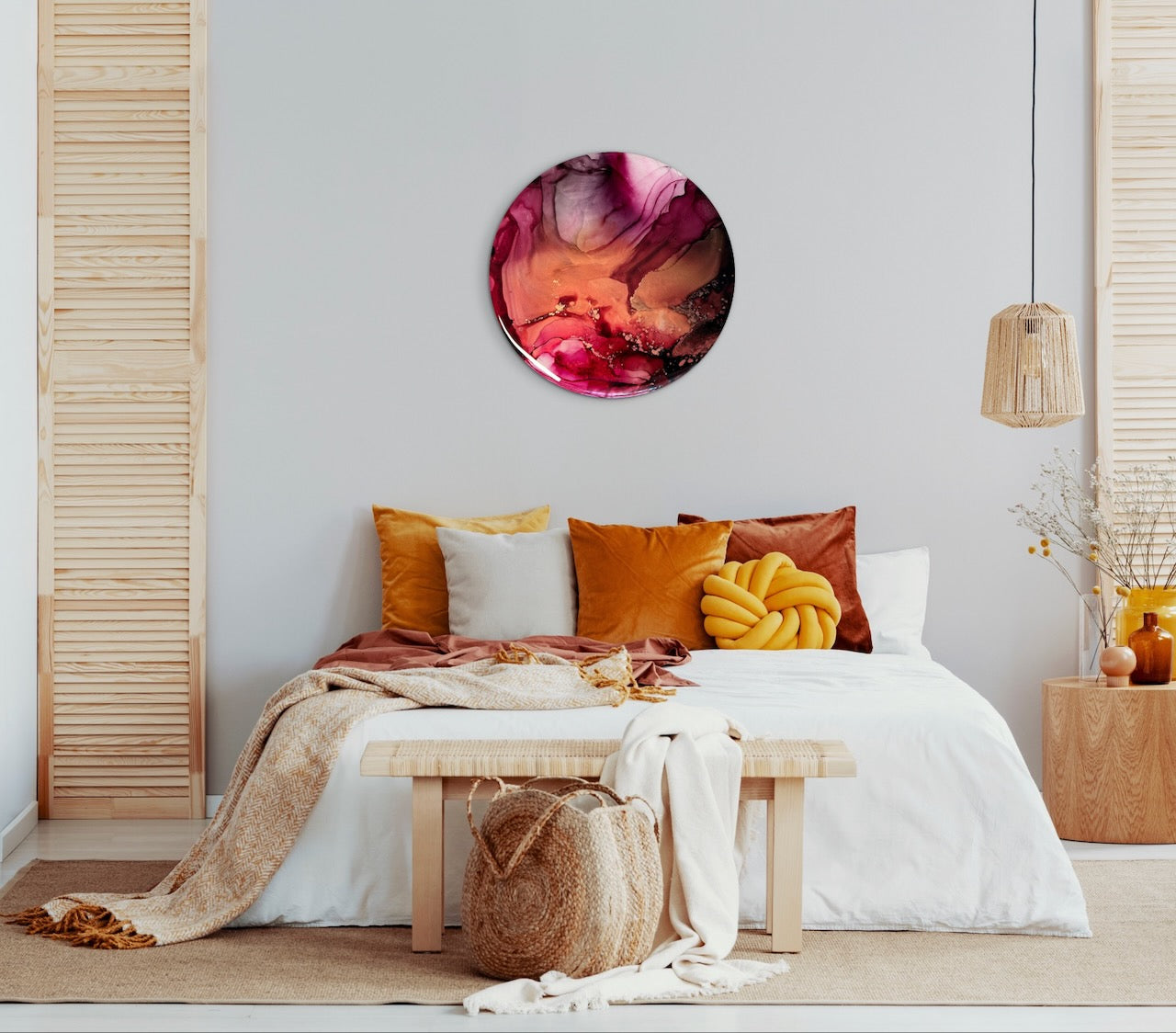 Decorative wall art above a bed with colourful pillows in a bedroom setting. Cosy wall art with dark pink, copper and black that helps deliver a warm ambience to your room. Rebirth symbolism in art of rising from our troubles and vulnerabilities.