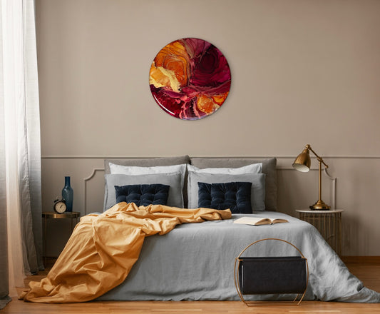 Bedroom art as a colourful abstract painting on a wall above a bed. Fire art featuring orange, red and gold to help add a warm and cosy ambience to your room. A symbol of rebirth, based on the phoenix legend and tarot death card where our passion pushes us to new heights and our courage leads to our salvation by Inkandescent Arts.