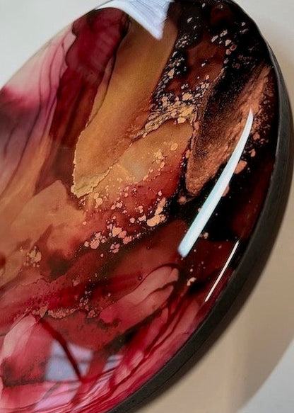 Bedroom wall decor in abstract art. Style for your home in warm colours. Circular and a glossy. Red artwork, handcrafted and ready to hang.
