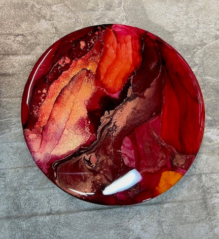 Art symbolism of the Pheonix rising representing strength and resilience. Featuring bold, sunset colours and breathtaking shimmers of gold and copper. 6 inch art for small spaces.  This red painting can reside on your wall or could be placed on a stand on your mantle, a shelf or a desk.
