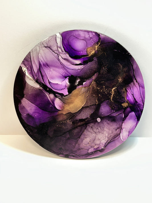 Black and purple artwork with shadowed webs and veils.