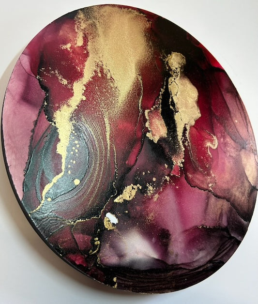 Circle artwork featuring deep red, black and gold clusters and lines that fade from bold to ethereal mystical blending.  Transformation symbolism and a symbol of fortitude based on the major arcana death card and phoenix of myth - by Inkandescent Arts.