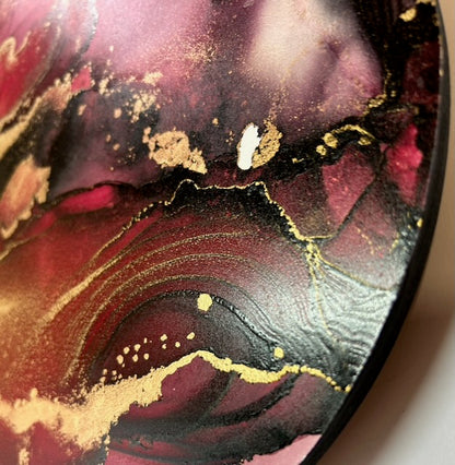 Phoenix rebirth symbolism art partial showing bold and ethereal colours of black, red and gold clusters and lines. Slight texturing of black adds interest and the fades become an incandescent white surrounded by deeper colours.                Mystical symbolism also based on the death tarot card - of endings and beginnings. An encouragement to leave behind old rituals and find new healthier ones.