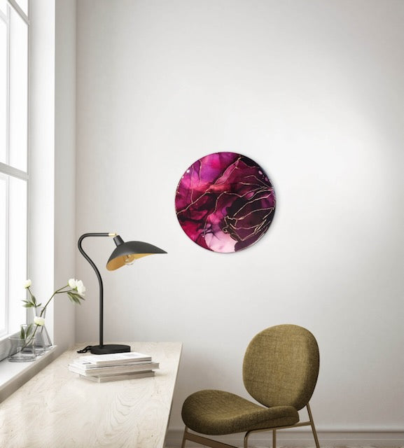 Office wall art hangs above a desk. Kintsugi art of dark red and purple violet that melds the death tarot card meaning and the phoenix fire bird into symbolic art.  Healing symbol by Inkandescent Arts.