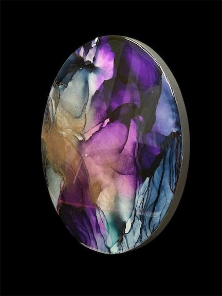 A circle painting of deep purple, agate and green. Depth filled and mysterious. A gate to the underworld where Psyche portals to one of the trials of Aphrodite. A portal painting symbolism of love and transformation.
