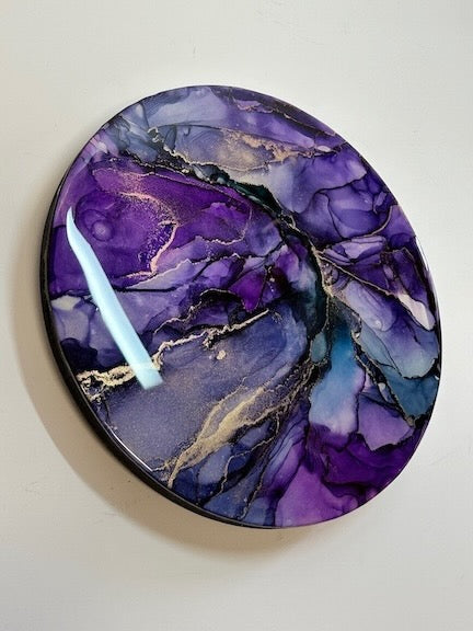 Round art, angled, featuring purple and gold metallic threads. An abstract painting of an electrical portal. Art of symbolism - of the subconscious mind and spirit by Inkandescent Arts.