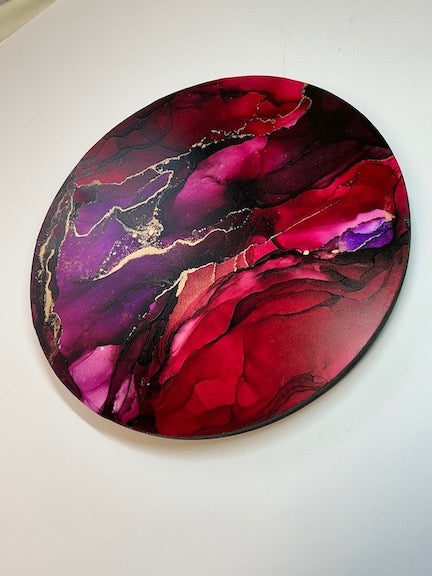 Unique home gifts in red and purple and metallic detail.  Wall decor in a circle formation, handmade and  ready to hang.


