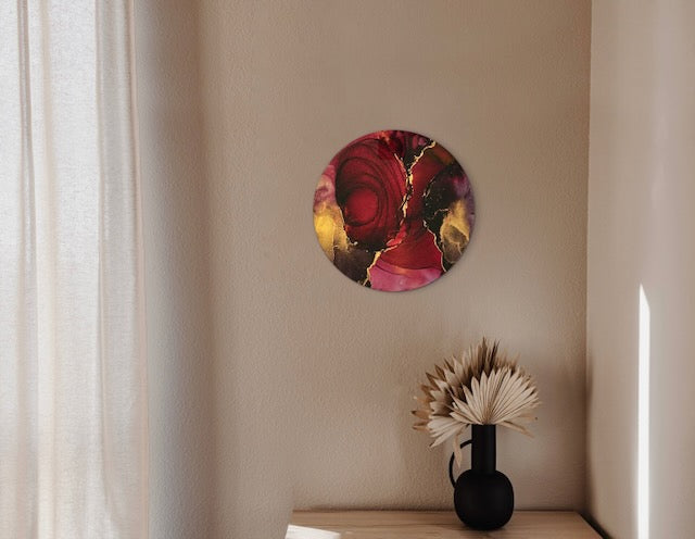 Contemporary abstract displayed on a wall. Featuring red, rich gold and black with spiralling depth, this symbolic art embodies renewal, healing and spiritual growth through phoenix rising -  by Inkandescent Arts.