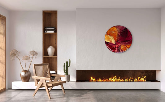 A fiery, original painting on a modern sitting room wall with a fireplace. Abstract wall art featuring deep red, orange and gold - a representation of challenging times, strength, rebirth and renewal 
Fire art of 10 inches create a warm and cozy vibes for your home by Inkandescent Arts.