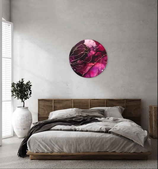 Modern bedroom with a round abstract painting on the wall featuring burgundy, red, mystical purple and copper lines. Death arcana tarot card and phoenix symbolism representing transformation, life and death - by Inkandescent Arts.